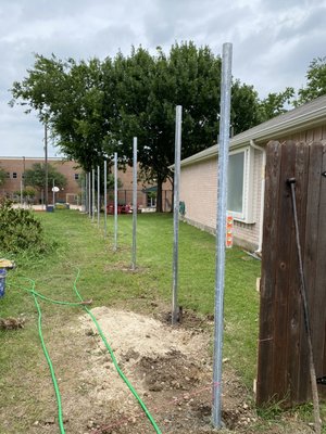 Wood fence install - This is a 400ft 8 ft tall fence install Wood fence install - This is a 400ft 8 ft tall fence install