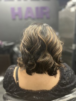 Wig install with a cut and style - This is a wig install which involves a wash and deep conditioner. For this client I also performed a high frequency service to combat hair loss. Then the natural hair was braided down into a cornrow style, capped and then her glue less wig was installed. Lastly, the hair was cut and styled.