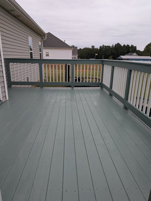 new deck rebuild - so we took all the original handrails and original deck boards off and basically stripped the deck down to the frame. we beefed up the frame in areas where it needed it and installed new pressure treated kiln-dried deck boards and brand new handrails and then solidified the deck with three coats of exterior grade. super deck paint from Sherwin-Williams. the customer was so ecstatic when they seen the finished look