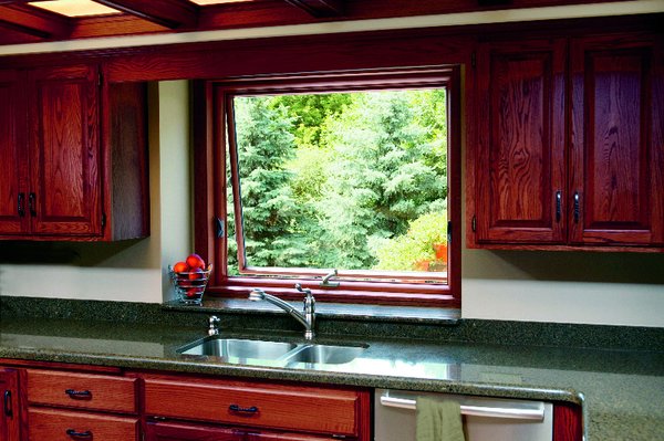 Awning Windows - Awning windows are hinged on the top and open outward from the bottom, allowing for ventilation and protection from the rain. This style is usually placed higher on walls for privacy or in combination with large stationary windows for a better view. Renewal by Andersen awning windows are the best choice for a guest bedroom or over the kitchen sink to let in the sunshine and cool breeze.

As with all of our replacement windows and patio doors, our replacement awning windows are custom crafted to fit your home and highly energy efficient. So, let the fresh air in by installing awning windows in your home or give us a call to schedule your free in-home consultation today!