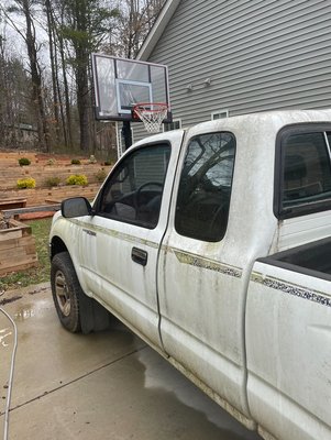 Exterior car wash detail for 1997 Toyota Tacoma - Check out this amazing transformation! The before shot shows a car covered in organic film and general grime, looking a bit tired and neglected. But after a thorough wash and exterior detail, it's like a brand new truck! Regular washes not only keep your car looking great but also protect the paint and finish from damage.