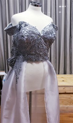 Custom/Bespoke Formal - The bodice of this custom gown is finished with handsewn appliques. It is showndraped on the mannequin checking for placement of more appliques. The client wearing her gown finished custom gown that fits perfectly in all the right places. Custom/Bespoke Formal - The bodice of this custom gown is finished with handsewn appliques. It is showndraped on the mannequin checking for placement of more appliques. The client wearing her gown finished custom gown that fits perfectly in all the right places.