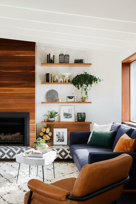 Modern, yet Eclectic Living Room - This living room blends modern minimalism with eclectic and natural elements, creating a space that feels both curated and comfortable. The clean architectural lines of white walls, exposed beams, and a large picture window anchors the space in modern design, while the mix of textures and materials adds personality and warmth. Modern, yet Eclectic Living Room - This living room blends modern minimalism with eclectic and natural elements, creating a space that feels both curated and comfortable. The clean architectural lines of white walls, exposed beams, and a large picture window anchors the space in modern design, while the mix of textures and materials adds personality and warmth.