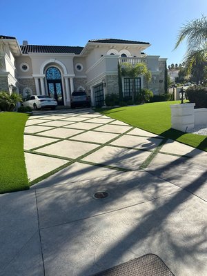 driveway construction - We installed concrete squres, turf and landscape rocks per customer design in order to extend driveway area and upgrade the front yard look to fit the high end neighborhood standards. driveway construction - We installed concrete squres, turf and landscape rocks per customer design in order to extend driveway area and upgrade the front yard look to fit the high end neighborhood standards.