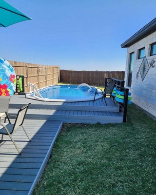 Semi-Inground Pool - Dive into luxury with our semi above ground pools, blending the best of both worlds for a unique swimming experience. Our expert team specializes in crafting custom semi above ground pools that seamlessly integrate with your landscape, providing a stunning addition to your outdoor space. Experience the perfect harmony of style and functionality with our tailored pool solutions.