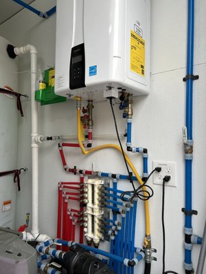 Navien tankless water heater installed and maintained - Retrofitted a mobile home for tankless water heater with storage tank. Navien tankless water heater installed and maintained - Retrofitted a mobile home for tankless water heater with storage tank.