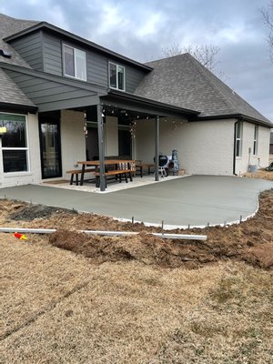 Patio - This is a patio addition to make room for a grill and a seating area. We finished this in a couple days. We also poured a sidewalk to have a parking spot for the trash can on the side of the house. Patio - This is a patio addition to make room for a grill and a seating area. We finished this in a couple days. We also poured a sidewalk to have a parking spot for the trash can on the side of the house.