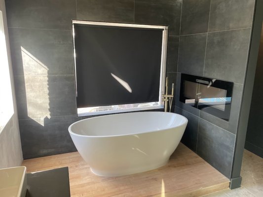 Bathtub - New bathtub with an electric fireplace for a bathroom remodeling