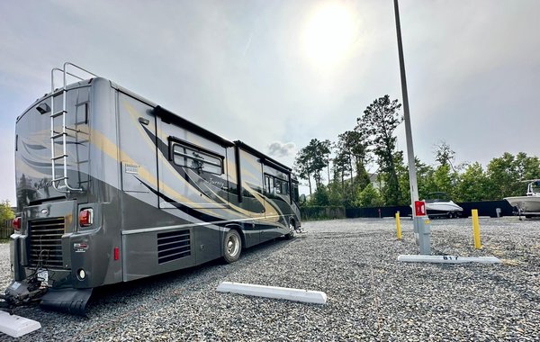 Secure RV and Boat Storage With 50 Amp Power Connectors - Discover the perfect storage solution for your RV or boat at our new Powered Storage & Parking facility in Leland. Our secure, gated facility offers individually metered 20,30,50 AMP NEMA powered Pedestals.
Location: 9550 Ploof Road, Leland (near Waterford / ALDI Grocery on Highway 17)
🔹 Size: 27', 32', 40' and 68' parking spaces 🔹 Rent Period: Monthly
Top Features:
✓ 24/7/365 access
✓ 20/30/50 NEMA outlets for every spot
✓ 24-hour access for your convenience
✓ Touchless gate entry
✓ Temperature and Humidity Monitoring via phone app
✓ State-of-the-art camera monitoring via phone app
✓ Gravel yard to accommodate all weather conditions
Ideal for RV & Boat Owners:
Our facility is designed with RV and boat owners in mind, providing secure and accessible storage for your valuable assets.
Easy to Find:
We're conveniently located just 10 minutes from downtown Wilmington, with easy access to major highways. Find us near the Aldi and Lowes Hardware. Secure RV and Boat Storage With 50 Amp Power Connectors - Discover the perfect storage solution for your RV or boat at our new Powered Storage & Parking facility in Leland. Our secure, gated facility offers individually metered 20,30,50 AMP NEMA powered Pedestals.
Location: 9550 Ploof Road, Leland (near Waterford / ALDI Grocery on Highway 17)
🔹 Size: 27', 32', 40' and 68' parking spaces 🔹 Rent Period: Monthly
Top Features:
✓ 24/7/365 access
✓ 20/30/50 NEMA outlets for every spot
✓ 24-hour access for your convenience
✓ Touchless gate entry
✓ Temperature and Humidity Monitoring via phone app
✓ State-of-the-art camera monitoring via phone app
✓ Gravel yard to accommodate all weather conditions
Ideal for RV & Boat Owners:
Our facility is designed with RV and boat owners in mind, providing secure and accessible storage for your valuable assets.
Easy to Find:
We're conveniently located just 10 minutes from downtown Wilmington, with easy access to major highways. Find us near the Aldi and Lowes Hardware.