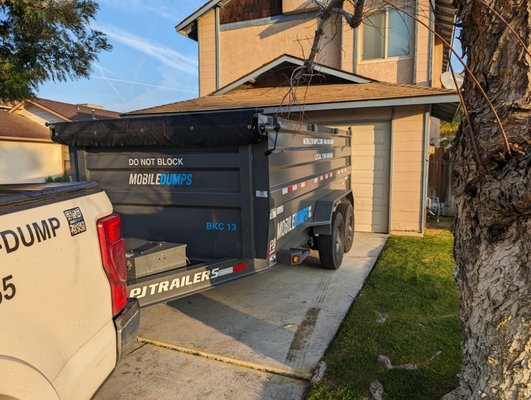 Precision placement - Dumpster rental for a roofing job Precision placement - Dumpster rental for a roofing job