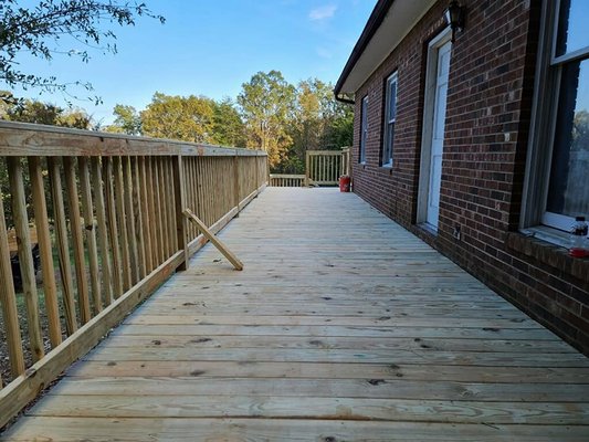 Deck Addition - Recent decking done on a home remodel. Starting with an existing front porch and now transformed into a wrap around deck. Coverage for the basement entry way and a large deck for the owner to enjoy outside of the master.