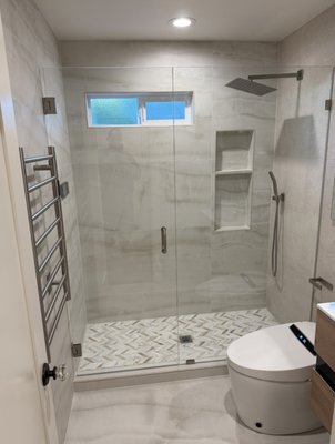 Bathrooms & Custom Showers - From full bathroom remodels to custom tile showers and simple upgrades like vanity swaps or fresh paint. We handle projects of all sizes. Explore our work featuring modern layouts, luxury finishes, and smart space solutions that add comfort and style to any bathroom.