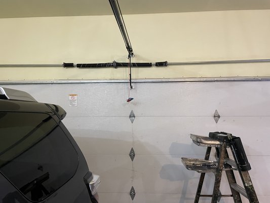 Fixed broken garage door torsion spring - A customer called with a garage door that would not open.  I went out and found they had a broken spring and quickly and safely replaced the springs so they could open and close their garage door again.