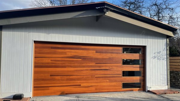 Single Door Garages - Insulated and Non-Insulated Modern Glass appearance.