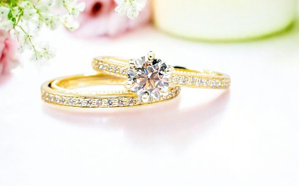 Custom Design 14k yellow gold Wedding Set - This was a custom design which a customer brought in a picture of a wedding set that he found online on Etsy. I then had that picture sent and made a replica of the ring and I added a 1ct natural diamond center stone to complete the job. Custom Design 14k yellow gold Wedding Set - This was a custom design which a customer brought in a picture of a wedding set that he found online on Etsy. I then had that picture sent and made a replica of the ring and I added a 1ct natural diamond center stone to complete the job.