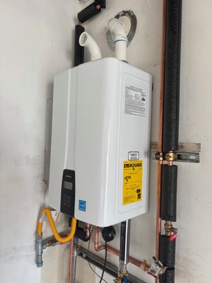 Tank to Tankless water heater retrofit - This is a typical Navien tankless installation in a garage where a tank water heater was installed. This project, like many others, we are able to cut down the waste of water while waiting for the hot water to get to the fixture. This saves water and SoCal Gas gives big rebates to customers who switch to tankless. Tank to Tankless water heater retrofit - This is a typical Navien tankless installation in a garage where a tank water heater was installed. This project, like many others, we are able to cut down the waste of water while waiting for the hot water to get to the fixture. This saves water and SoCal Gas gives big rebates to customers who switch to tankless.