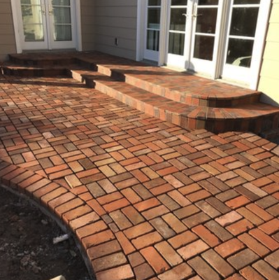 Patio Brick Lay - Choose from a range of options including brick, concrete or cobblestone to match or improve the current theme of your home. Patio Brick Lay - Choose from a range of options including brick, concrete or cobblestone to match or improve the current theme of your home.