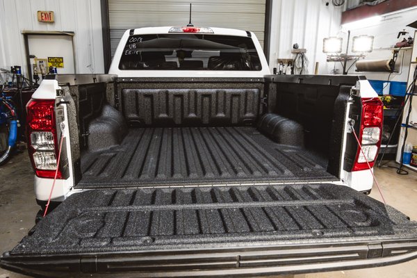 Spray-in Bedliner & Protective Coatings For Trucks, Vans, SUVs, Vehicle Accessories - Madison Auto Trim has been providing high quality spray-in bedliners and protective coatings since 1987. Our team uses a high pressure hot spray system to apply bedliners and coatings, resulting in a durable, seamless finish with a professional appearance.
In addition to truck beds, our protective coatings can be applied to other high impact areas to help guard against scratches, rust, and daily use. The material we use maintains its texture and grip, even through the toughest wear. As a family owned and operated business, we stand behind our products with a Lifetime Warranty!
Since 1987, Madison Auto Trim has professionally sprayed over 30,000 truck beds with durable spray-in bedliners. With decades of experience and a reputation built on quality craftsmanship, our team delivers trusted protection that truck owners across Wisconsin can rely on.
Protective bedliner coatings safeguard your truck bed from impact, abrasion, moisture, and corrosion. By forming a durable barrier, spray-in liners prevent rust, reduce long-term damage, and help maintain resale value, making them a smart investment for any truck owner. Spray-in Bedliner & Protective Coatings For Trucks, Vans, SUVs, Vehicle Accessories - Madison Auto Trim has been providing high quality spray-in bedliners and protective coatings since 1987. Our team uses a high pressure hot spray system to apply bedliners and coatings, resulting in a durable, seamless finish with a professional appearance.
In addition to truck beds, our protective coatings can be applied to other high impact areas to help guard against scratches, rust, and daily use. The material we use maintains its texture and grip, even through the toughest wear. As a family owned and operated business, we stand behind our products with a Lifetime Warranty!
Since 1987, Madison Auto Trim has professionally sprayed over 30,000 truck beds with durable spray-in bedliners. With decades of experience and a reputation built on quality craftsmanship, our team delivers trusted protection that truck owners across Wisconsin can rely on.
Protective bedliner coatings safeguard your truck bed from impact, abrasion, moisture, and corrosion. By forming a durable barrier, spray-in liners prevent rust, reduce long-term damage, and help maintain resale value, making them a smart investment for any truck owner.