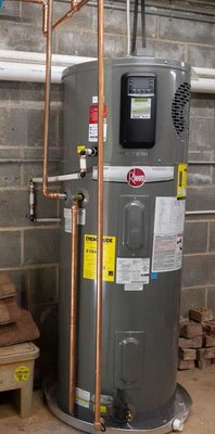 Hybrid electric water heater. - A Hybrid electric Water Heater, uses ambient warm air in the area of installation to help maintain hot water temperature and cut down on electricity costs. Hybrid electric water heater. - A Hybrid electric Water Heater, uses ambient warm air in the area of installation to help maintain hot water temperature and cut down on electricity costs.