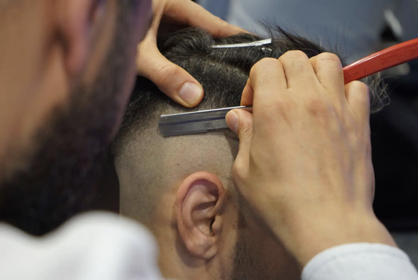 Straight Razor Shaves - Straight Razor Shaves
If you're looking for a close, comfortable shave in Smyrna, TN, straight razor shaves at Wet Kutz Plus Barbershop & Salon deliver the precision and care that over-the-counter razors simply cannot match. Our barbers use traditional technique and attention to detail to give you a smooth finish while treating your skin with respect. A straight razor shave is more than grooming - it's a ritual that leaves you feeling refreshed and confident.
Professional prep and hot lather application soften your beard for a closer, more comfortable shave.
Precise blade work removes hair cleanly without nicks, irritation, or razor burn.
Aftershave care and skin conditioning keep your face healthy and protected after your shave.
Classic barbershop experience that combines old-school grooming with modern cleanliness standards.
Personalized technique tailored to your skin type and beard growth pattern.
Expert barbers who understand the craft and take time to do it right.
When you visit us in the Smyrna area, you'll experience the difference a skilled straight razor shave makes. Reach out to Wet Kutz Plus Barbershop & Salon today to schedule your appointment. Straight Razor Shaves - Straight Razor Shaves
If you're looking for a close, comfortable shave in Smyrna, TN, straight razor shaves at Wet Kutz Plus Barbershop & Salon deliver the precision and care that over-the-counter razors simply cannot match. Our barbers use traditional technique and attention to detail to give you a smooth finish while treating your skin with respect. A straight razor shave is more than grooming - it's a ritual that leaves you feeling refreshed and confident.
Professional prep and hot lather application soften your beard for a closer, more comfortable shave.
Precise blade work removes hair cleanly without nicks, irritation, or razor burn.
Aftershave care and skin conditioning keep your face healthy and protected after your shave.
Classic barbershop experience that combines old-school grooming with modern cleanliness standards.
Personalized technique tailored to your skin type and beard growth pattern.
Expert barbers who understand the craft and take time to do it right.
When you visit us in the Smyrna area, you'll experience the difference a skilled straight razor shave makes. Reach out to Wet Kutz Plus Barbershop & Salon today to schedule your appointment.