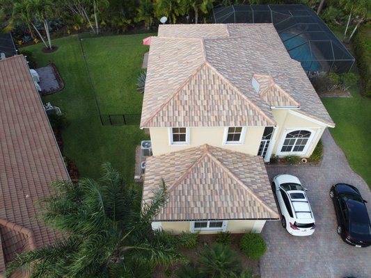 New Tile Roof in Martin County - This homeowner was very happy with how their new tile roof blend turned out. 2 neighbors decided to go with the same tile selection. We love our tile roofs!