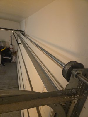 Emergency Off-track - Responded to an emergency service call for a garage door that had come off track with loose cables, leaving the door unsafe and inoperable. Safely secured the door, reset it on track, and properly reinstalled and tensioned the lift cables. Inspected rollers, tracks, drums, and hardware for damage, made necessary adjustments, and verified proper alignment and balance. Completed full safety check and tested operation to ensure smooth, safe performance before returning the door to service. Emergency Off-track - Responded to an emergency service call for a garage door that had come off track with loose cables, leaving the door unsafe and inoperable. Safely secured the door, reset it on track, and properly reinstalled and tensioned the lift cables. Inspected rollers, tracks, drums, and hardware for damage, made necessary adjustments, and verified proper alignment and balance. Completed full safety check and tested operation to ensure smooth, safe performance before returning the door to service.