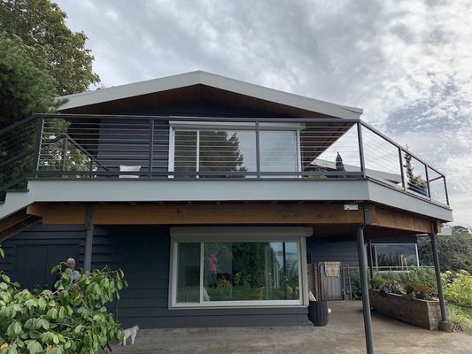 Mid-Century Modern Deck - We installed a beautiful deck in this mid-century home. The deck completes the home and adds an extra layer of depth to those beautiful views. Mid-Century Modern Deck - We installed a beautiful deck in this mid-century home. The deck completes the home and adds an extra layer of depth to those beautiful views.