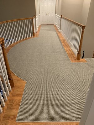 Hardwood floor and area rug - This photo was provided to us by a client that had their hardwood floors done by us. They also purchased the area rug from us in the photo of their dining room