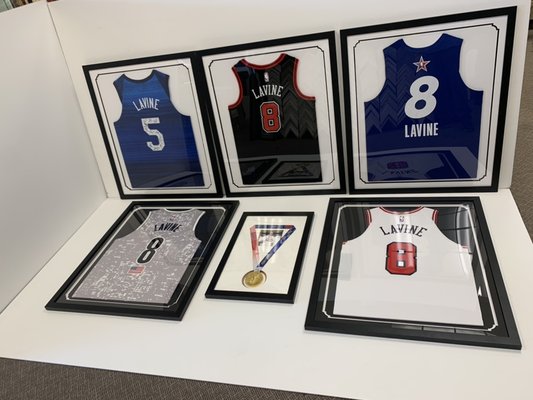 ZACK LAVINE framing project with Jerseys and Olympic gold medal from Tokyo - Zack’s project took 10 working days and was fun to work on. We framed nine jerseys and a gold medal for him. Thanks for your business ZACK. ZACK LAVINE framing project with Jerseys and Olympic gold medal from Tokyo - Zack’s project took 10 working days and was fun to work on. We framed nine jerseys and a gold medal for him. Thanks for your business ZACK.
