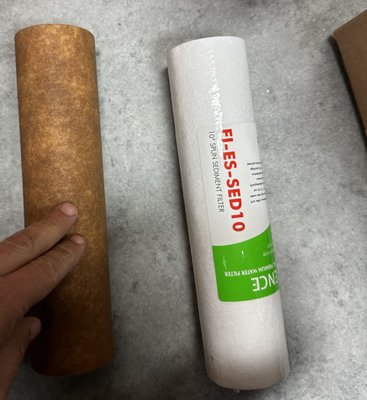 RO Filter replacement - This is what a clean filter looks like next to a dirty one. The dirty filter has not been replaced in six months