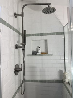 Shower Installations - Professionally roughed-in and trimmed a range of shower systems, including high-flow rain heads, dual-function hand-helds, and traditional fixed heads. Expertly handled diverse hardware finishes—including Brushed Nickel, Matte Black, and Polished Chrome—ensuring leak-free installation on custom tile and subway tile backdrops. Shower Installations - Professionally roughed-in and trimmed a range of shower systems, including high-flow rain heads, dual-function hand-helds, and traditional fixed heads. Expertly handled diverse hardware finishes—including Brushed Nickel, Matte Black, and Polished Chrome—ensuring leak-free installation on custom tile and subway tile backdrops.