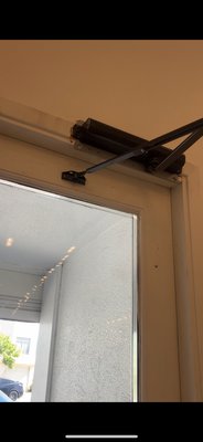 Door opener ADA - Removing old opener and install new opener heavy duty in Bluemercury store in San Francisco Francisco