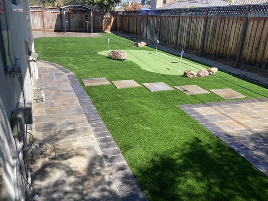 Turf and pavers - Another happy and satisfied client with their new back yard. Turf and pavers - Another happy and satisfied client with their new back yard.