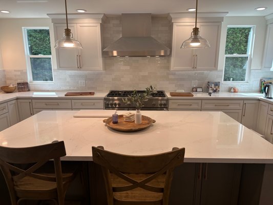 Westlake Village Kitchen Remodel - Double Shaker Cabinets; White on perimeter and Grey on island. Quartz countertops with subway tile backsplash. Westlake Village Kitchen Remodel - Double Shaker Cabinets; White on perimeter and Grey on island. Quartz countertops with subway tile backsplash.