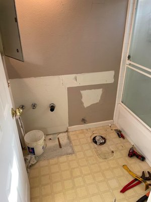 Small Bathroom Remodel - This little bathroom used the same footprint, but we replaced the vanity and toilet, and tiled the back wall around the vanity, new floor and fixtures, and painted everything. This project took about 4 days to complete. Small Bathroom Remodel - This little bathroom used the same footprint, but we replaced the vanity and toilet, and tiled the back wall around the vanity, new floor and fixtures, and painted everything. This project took about 4 days to complete.