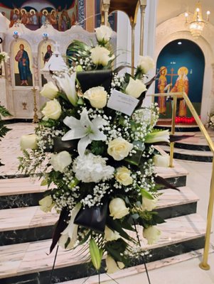 Memorial service July 2025. - Memorial service was on July 22 at Holy trinity Greek Orthodox Church
 , customer initially order only a basket and pass our flower shop information to her friends, and they ordered 2 white standing spray, a cross, a crown and another floral arrangement in a ceramic vase. Celebrate friends and loved one's life with Funeral and sympathy flowers from Estrella's flower shop.