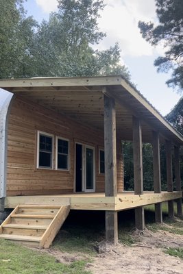 New wood porch, wood decking, metal roof, cedar siding, and slider door install. - We were called by a local general contractor to be subcontracted for the full porch install on this garage out in the Burgaw area of North Carolina. New wood porch, wood decking, metal roof, cedar siding, and slider door install. - We were called by a local general contractor to be subcontracted for the full porch install on this garage out in the Burgaw area of North Carolina.