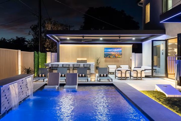 Paradise Valley Air BnB Project - This complete remodel in Paradise Valley was so much fun to work on and turned out to be a spectacular dream space. This home is now a high-end Airbnb rental, and with a backyard like this, you couldn't ask for much more while on vacation. Tons of porcelain paver deck space, 4K shade structures with color changing smart LED lights, a BBQ with a pristine porcelain countertop and all the appliances needed for any size dinner party, a gas fire pit with a travertine cap and unique travertine stone sides, hot tub for cold nights, and a wall dressed with wood like paneling and very real looking artificial vine panels. This place has functionality and style. Landscape 20/20 takes on projects of all sizes and would love to help transform your home for your enjoyment or for your investment. Call or message us today! Paradise Valley Air BnB Project - This complete remodel in Paradise Valley was so much fun to work on and turned out to be a spectacular dream space. This home is now a high-end Airbnb rental, and with a backyard like this, you couldn't ask for much more while on vacation. Tons of porcelain paver deck space, 4K shade structures with color changing smart LED lights, a BBQ with a pristine porcelain countertop and all the appliances needed for any size dinner party, a gas fire pit with a travertine cap and unique travertine stone sides, hot tub for cold nights, and a wall dressed with wood like paneling and very real looking artificial vine panels. This place has functionality and style. Landscape 20/20 takes on projects of all sizes and would love to help transform your home for your enjoyment or for your investment. Call or message us today!