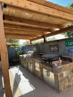 Outdoor Kitchens and Living Areas - Franklin Foliage & Landscaping specializes in designing and building custom outdoor kitchens that transform your backyard into a stylish and functional living space. Our experienced team works closely with homeowners to create unique, high-quality outdoor kitchens tailored to your cooking and entertaining needs, using premium materials for lasting durability and appeal. From built-in grills and countertops to sinks and storage, we handle every aspect of your outdoor kitchen project with exceptional attention to detail. Trust Franklin Foliage & Landscaping to elevate your outdoor experience with expert craftsmanship and service you can count on. Outdoor Kitchens and Living Areas - Franklin Foliage & Landscaping specializes in designing and building custom outdoor kitchens that transform your backyard into a stylish and functional living space. Our experienced team works closely with homeowners to create unique, high-quality outdoor kitchens tailored to your cooking and entertaining needs, using premium materials for lasting durability and appeal. From built-in grills and countertops to sinks and storage, we handle every aspect of your outdoor kitchen project with exceptional attention to detail. Trust Franklin Foliage & Landscaping to elevate your outdoor experience with expert craftsmanship and service you can count on.