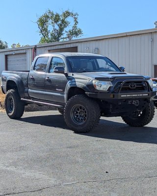 2nd Gen Tacoma Spindle Gussets, Cam Tab Gussets, Body Mount Relocation - This 2nd Gen Toyota Tacoma wanted to run bigger tires and wanted to strengthen up his front end to prevent trail failures. We did a body mount relocation which allows clearance for 35 inch tires, cam tab gussets which prevent cam tab flattening and loosing your alignment and spindle gussets which stregthen your spindle to prevent bending. 2nd Gen Tacoma Spindle Gussets, Cam Tab Gussets, Body Mount Relocation - This 2nd Gen Toyota Tacoma wanted to run bigger tires and wanted to strengthen up his front end to prevent trail failures. We did a body mount relocation which allows clearance for 35 inch tires, cam tab gussets which prevent cam tab flattening and loosing your alignment and spindle gussets which stregthen your spindle to prevent bending.