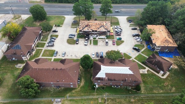 Commercial Apartments - This complex was out in Longview Texas. It was in serious need of a roof replacement. Having old 3 Tab shingles that don't last well with wind. Upgrading them to an architectural shingle that has a 110 mph wind rating. The black shingle goes so well with a dark red brick. Commercial Apartments - This complex was out in Longview Texas. It was in serious need of a roof replacement. Having old 3 Tab shingles that don't last well with wind. Upgrading them to an architectural shingle that has a 110 mph wind rating. The black shingle goes so well with a dark red brick.