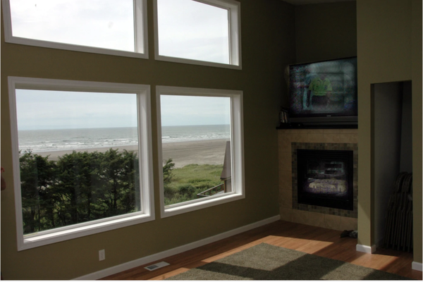 Upper Level - Each R and R House unit has a big room with a big-screen TV , DVD and cable plus free wireless internet. Three bedrooms, two bathrooms (we like the double showers!), a fully-stocked kitchen including side-by-side fridge, free laundry, hot tub, room for up to 34 seated, including folding tables and chairs, and beautiful ocean views. Upper Level - Each R and R House unit has a big room with a big-screen TV , DVD and cable plus free wireless internet. Three bedrooms, two bathrooms (we like the double showers!), a fully-stocked kitchen including side-by-side fridge, free laundry, hot tub, room for up to 34 seated, including folding tables and chairs, and beautiful ocean views.