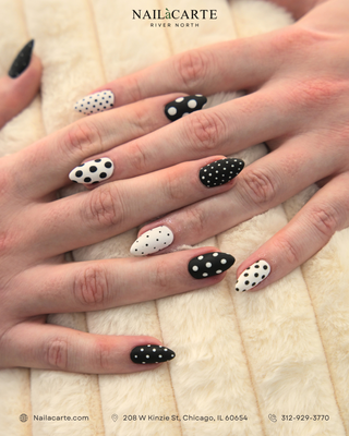 Moderate Nail Art - More detailed designs with added creativity and dimension. Includes multiple accents, layered elements, mixed patterns, or hand-drawn details for a balanced, polished look. Ideal for clients who want something artistic yet refined.