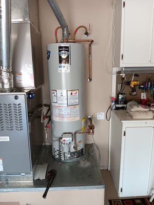 water heater install in Surprise AZ - Customer had called reported a leak on his old Bradford White brand water heater.No longer able to fix it so removed and replaced it with a brand new Ruud pro series, installed new hot and cold stainless steel supply lines and added a sediment trap to the gas line to keep it up to code standards.Also added a drip so in the coming future any leaks wouldn't damage drywall in back.Water heater comes with standard 6yr warranty from manufacturer u can also extend it for additional 4yrs for additional add on price. water heater install in Surprise AZ - Customer had called reported a leak on his old Bradford White brand water heater.No longer able to fix it so removed and replaced it with a brand new Ruud pro series, installed new hot and cold stainless steel supply lines and added a sediment trap to the gas line to keep it up to code standards.Also added a drip so in the coming future any leaks wouldn't damage drywall in back.Water heater comes with standard 6yr warranty from manufacturer u can also extend it for additional 4yrs for additional add on price.