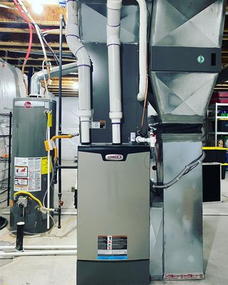 Clean Work, Basement Furnace - Clean Work! This furnace was installed a couple feet over from where the old one was. See the rust stain on the concrete? With our expert insight and 35+ years combined experience our installs prevent standing water and rust at the base of your new furnace.