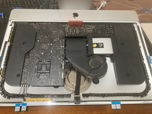Upgraded Mac drive to enhance speed - Customer had an old 21.5" 2012 Mac. It was holding up extremely well except that it had become a little slow. I recommended upgrading to an SSD. The customer ordered one I recommended and went forward with the project. It is tricky due to the adhesive that holds on the screen but I was able to find the necessary parts on Amazon. Once they arrived I got to work. Made an exact clone of the old drive so he would not lose any data and placed the new SSD into the computer. Customer was very satisfied with the enhanced speed of the device. And now he has a physical backup of his data as well in that old drive. Upgraded Mac drive to enhance speed - Customer had an old 21.5" 2012 Mac. It was holding up extremely well except that it had become a little slow. I recommended upgrading to an SSD. The customer ordered one I recommended and went forward with the project. It is tricky due to the adhesive that holds on the screen but I was able to find the necessary parts on Amazon. Once they arrived I got to work. Made an exact clone of the old drive so he would not lose any data and placed the new SSD into the computer. Customer was very satisfied with the enhanced speed of the device. And now he has a physical backup of his data as well in that old drive.