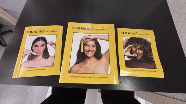 Rush Pop-Up Posters for The Hair Generation at Fellini Cafe - The Hair Generation, a haircare brand, hosted a pop-up event at Fellini, a few doors down from us. We've printed for Fellini before, so when the brand needed posters for the event on short notice, they came straight to us at 8 a.m.
The posters had to fit Fellini's existing wall frames, which meant custom sizes (19.5" x 15.5" and 23.5" x 19.5"). Once we looked at the frames, it was clear they couldn't be opened without damaging them. Since the event only ran for a few hours, the fix was to mount the posters directly over the glass with double-sided tape. It kept the café's frames intact and still gave the look of framed artwork on the wall.
We delivered three custom-sized glossy posters plus five 8.5" x 11" glossy prints, all on a rush turnaround. Rush Pop-Up Posters for The Hair Generation at Fellini Cafe - The Hair Generation, a haircare brand, hosted a pop-up event at Fellini, a few doors down from us. We've printed for Fellini before, so when the brand needed posters for the event on short notice, they came straight to us at 8 a.m.
The posters had to fit Fellini's existing wall frames, which meant custom sizes (19.5" x 15.5" and 23.5" x 19.5"). Once we looked at the frames, it was clear they couldn't be opened without damaging them. Since the event only ran for a few hours, the fix was to mount the posters directly over the glass with double-sided tape. It kept the café's frames intact and still gave the look of framed artwork on the wall.
We delivered three custom-sized glossy posters plus five 8.5" x 11" glossy prints, all on a rush turnaround.