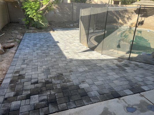 paver sidewalk & pavers around pool. - this renovation  was removing concrete, removing grass, replacing entire drip system front and back, adding pavers from the garage to the backyard pad that hugs the pool area. very clean and modern look!