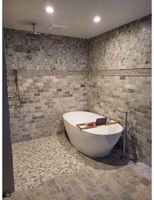 Open Concept Bathroom - Remodeled this master bathroom with an open concept. Owners enjoy the rustic look and added a standing tub.