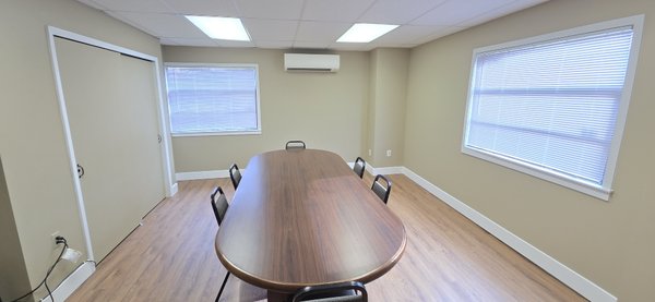 Office space remodel - This office space in a local business was in need of major help. We were able to get this done in 10 days and within budget. New drywall, floors, window casings and trim both windows and doors, all finished with fresh paint.